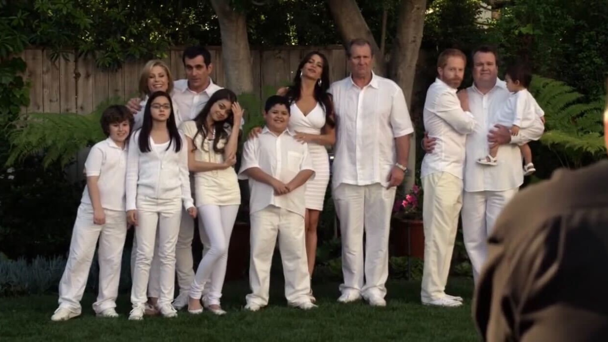 Then Group picture of Modern Family Stars wearing all-white