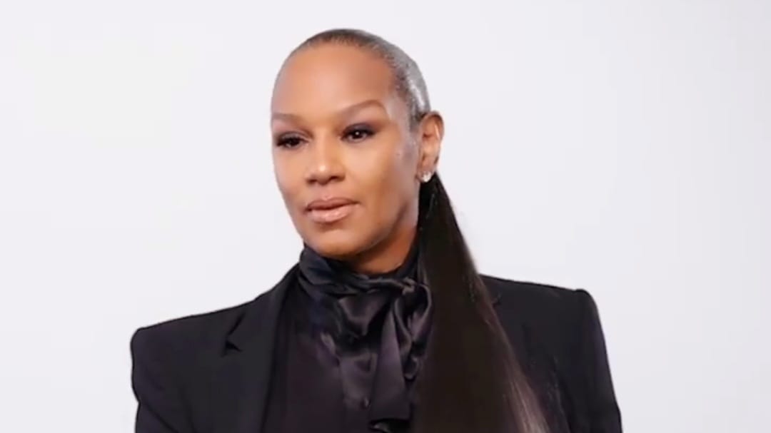 Jackie Christie posing for a photo at a public event.